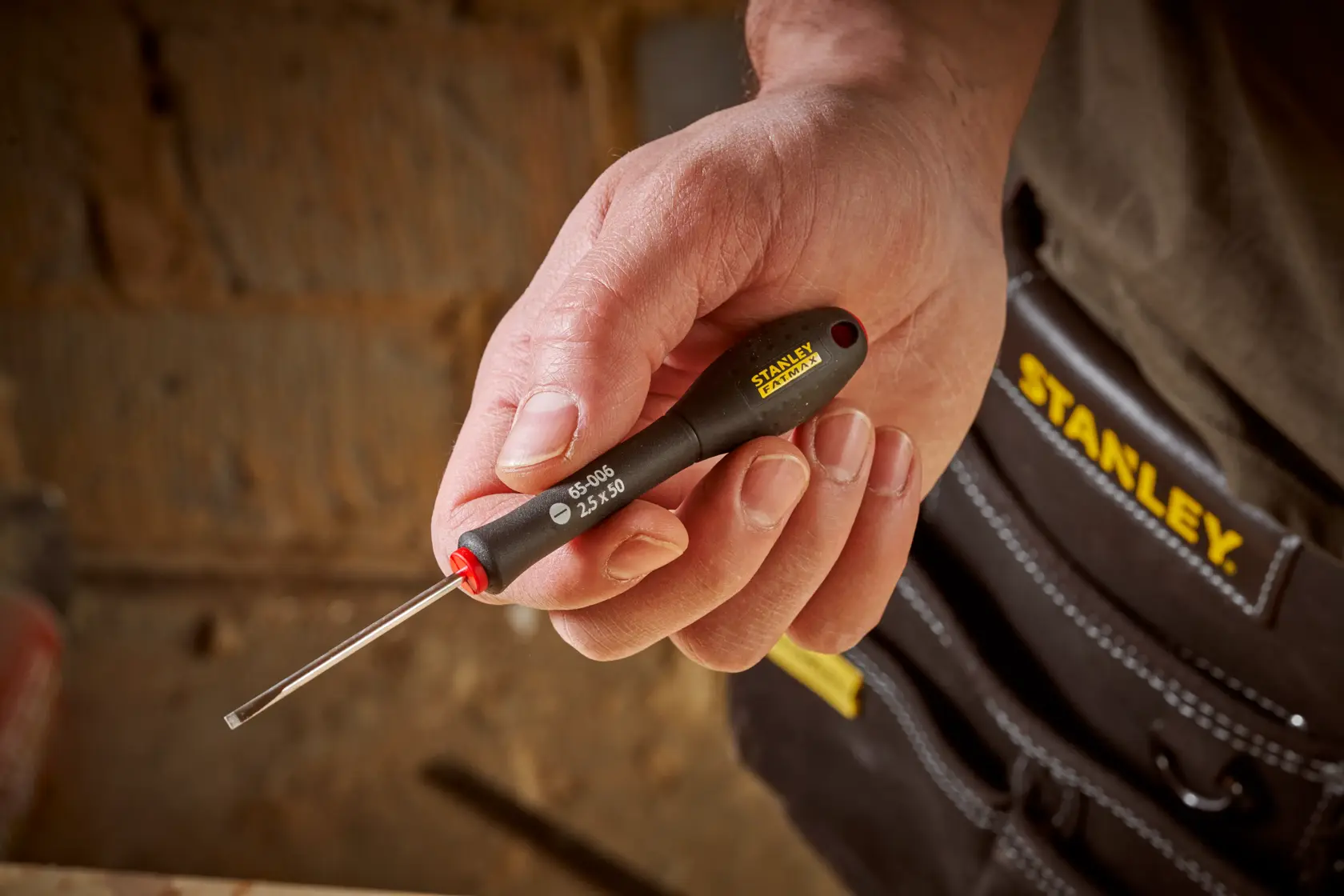 STANLEY® FATMAX® Parallel 2.5 x 50mm Screwdriver Application Action Shot Hand/Person