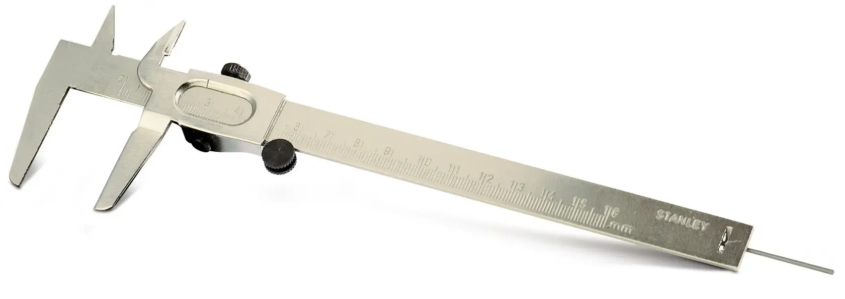 Stanley metal caliper with ruler scale for precise measurement on a white background.