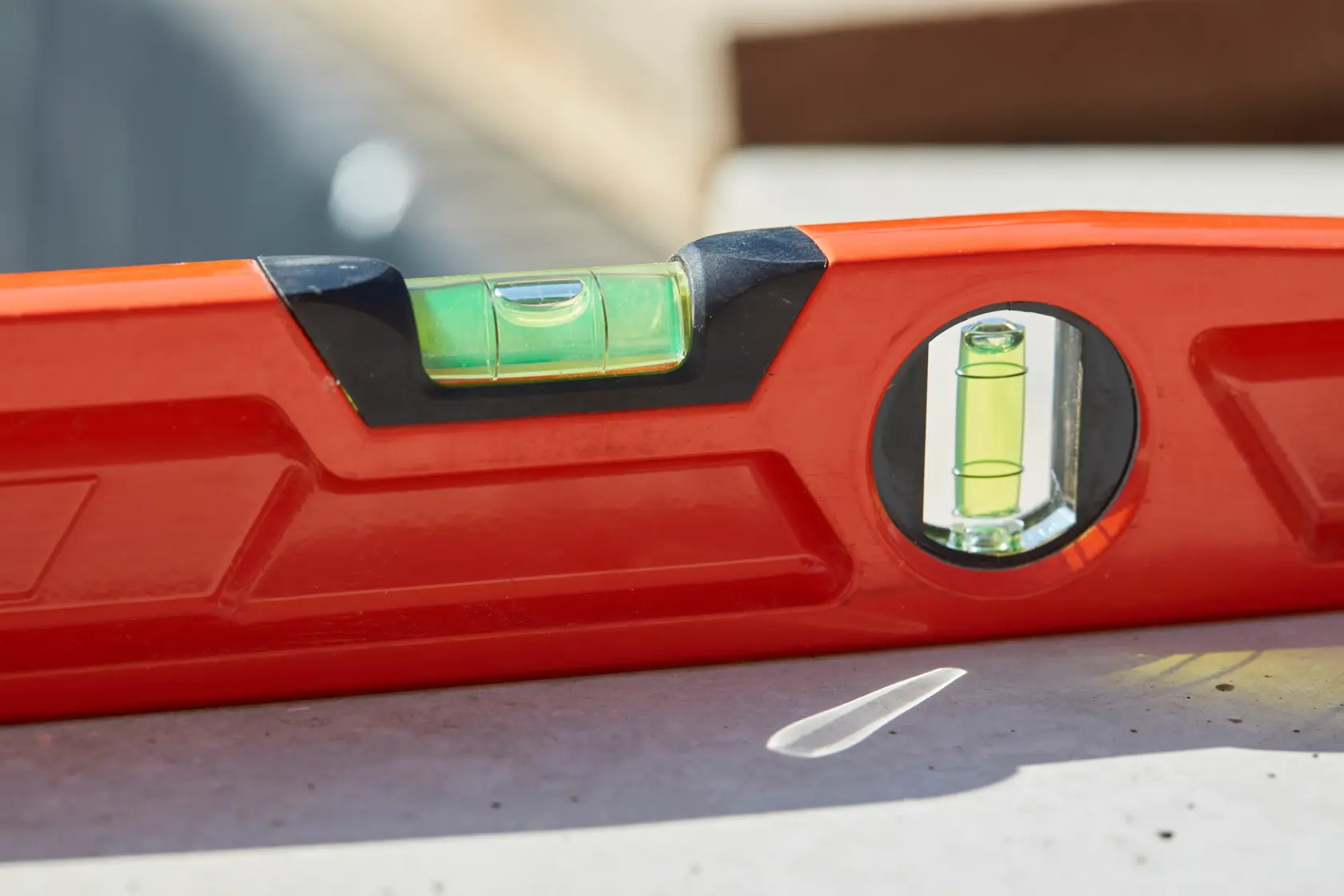 STANLEY 1-42-314 red spirit level close-up, showing vial details, photography outdoors.