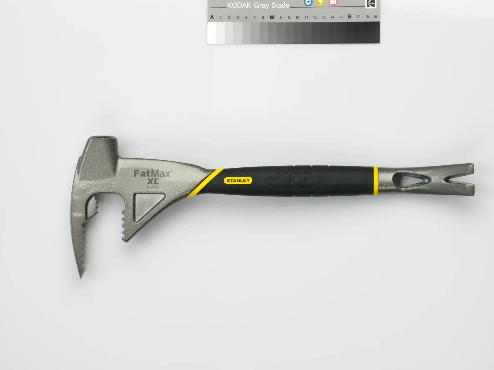 Stanley FatMax XL multi-purpose hammer tool with black and yellow handle, shown on a white background.