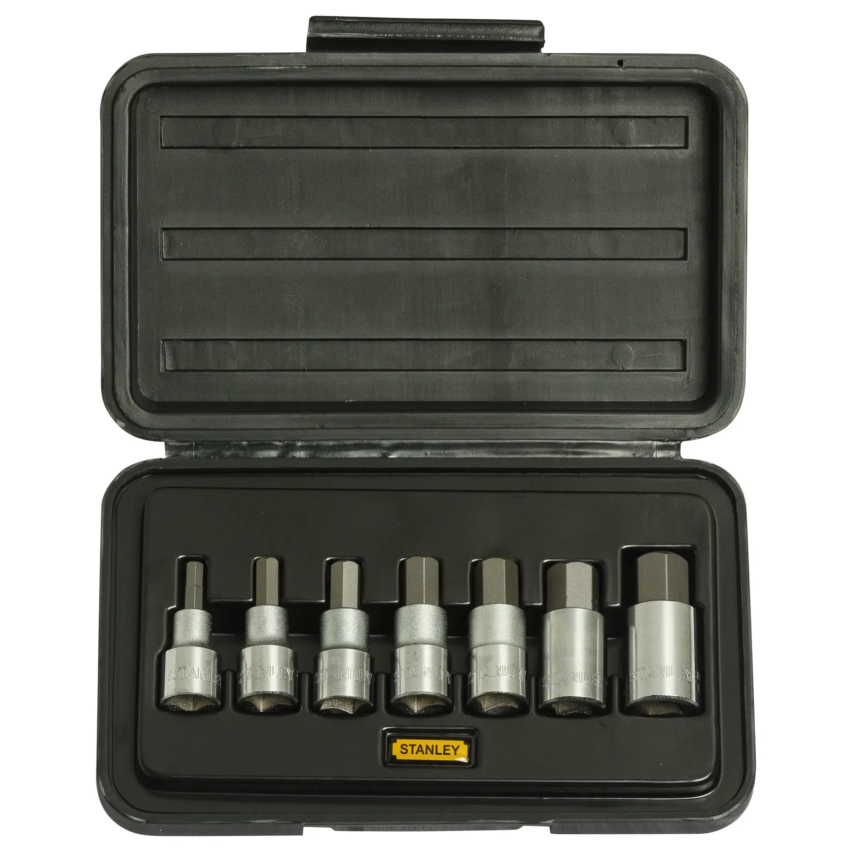 Stanley hex bit socket set in a black plastic case, showing seven sockets neatly arranged inside.