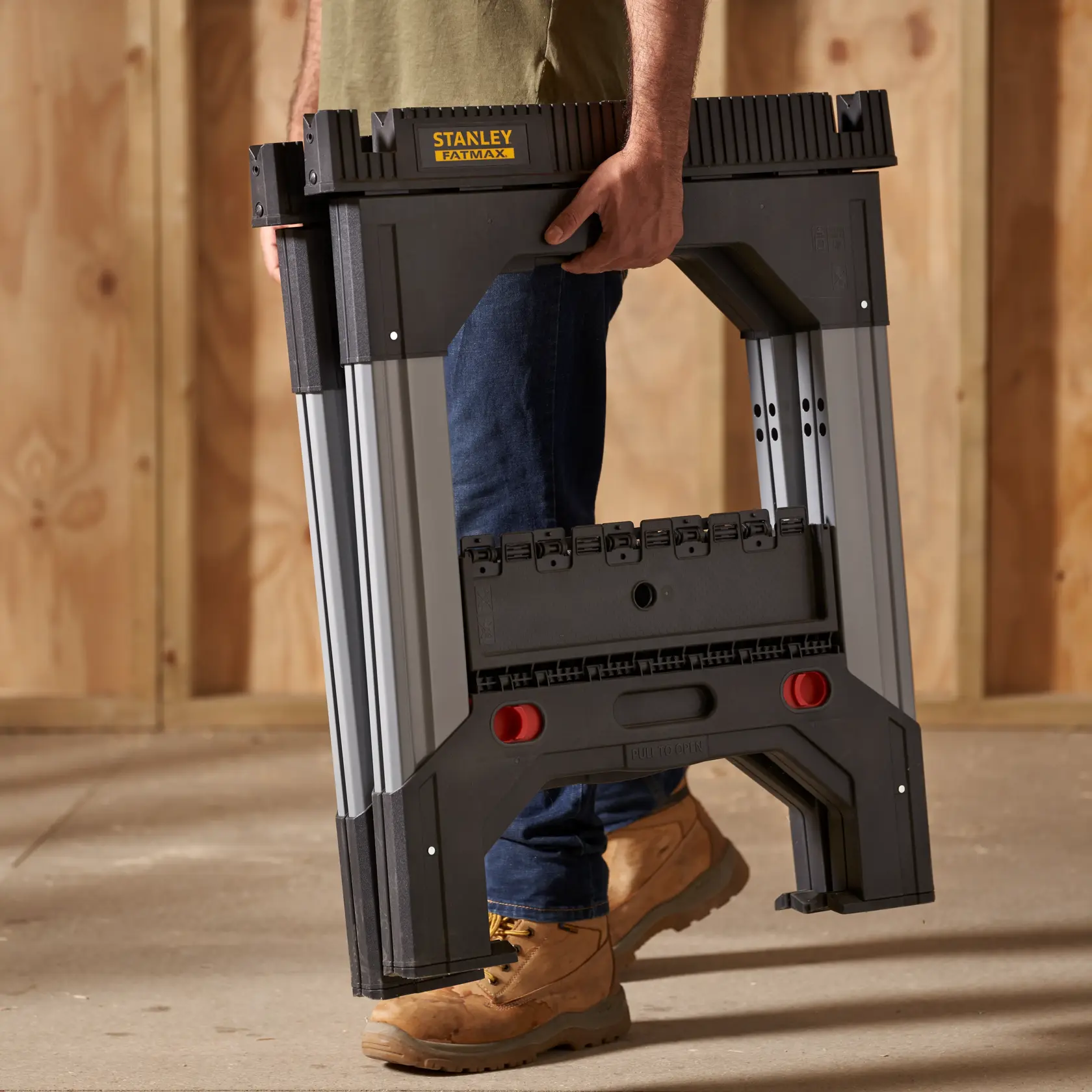 1-92-980 STANLEY® FATMAX® Folding Adjustable Height Metal Sawhorse (Pair), 1,135kg Max. Capacity, application image