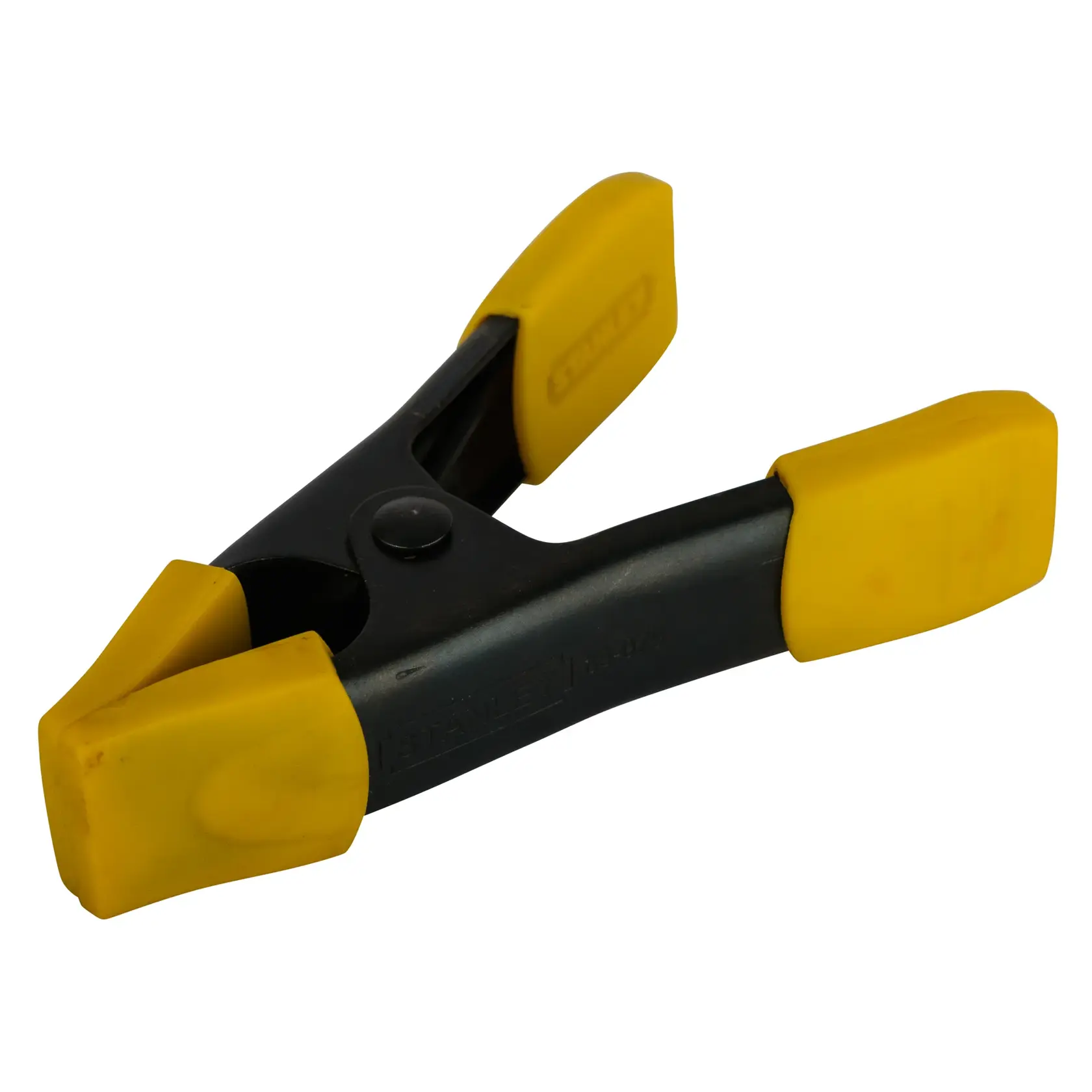Stanley spring clamp with black body and yellow rubber jaws used for securing objects in photography or workshops.