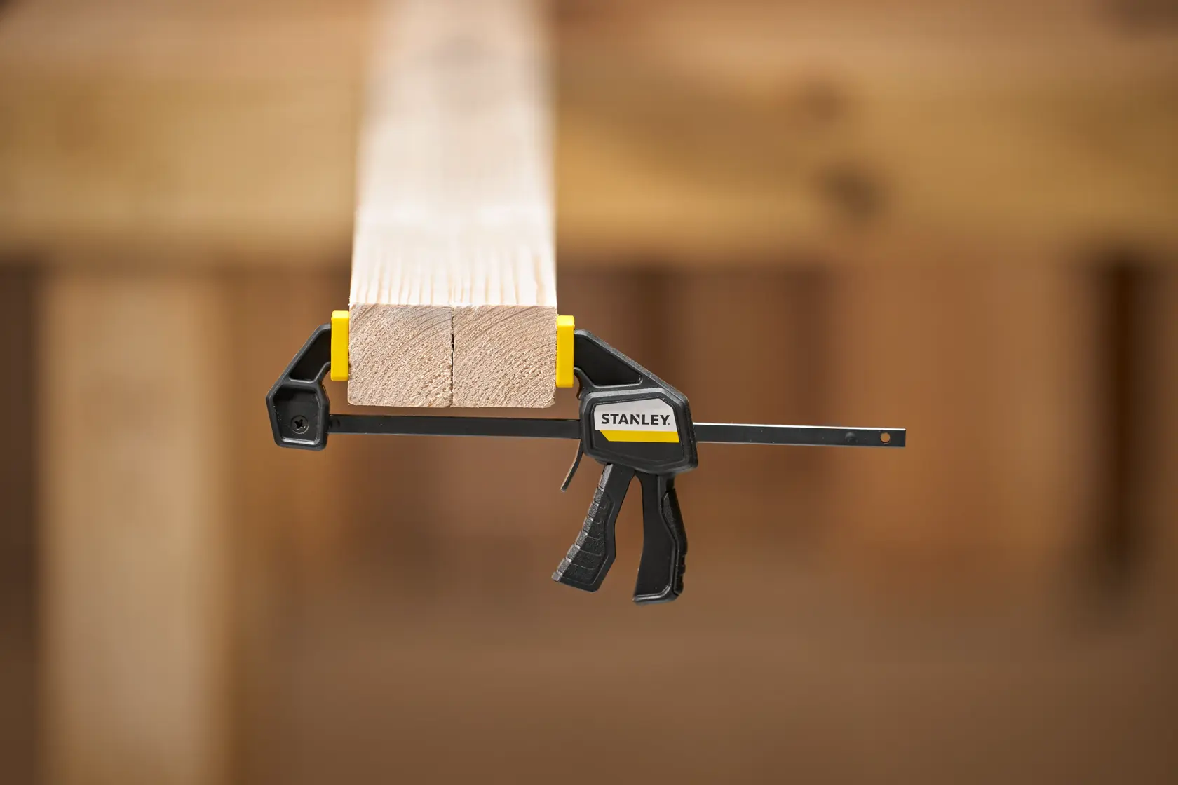 STANLEY FMHT83270-0 bar clamp holding wood, photography front angle.