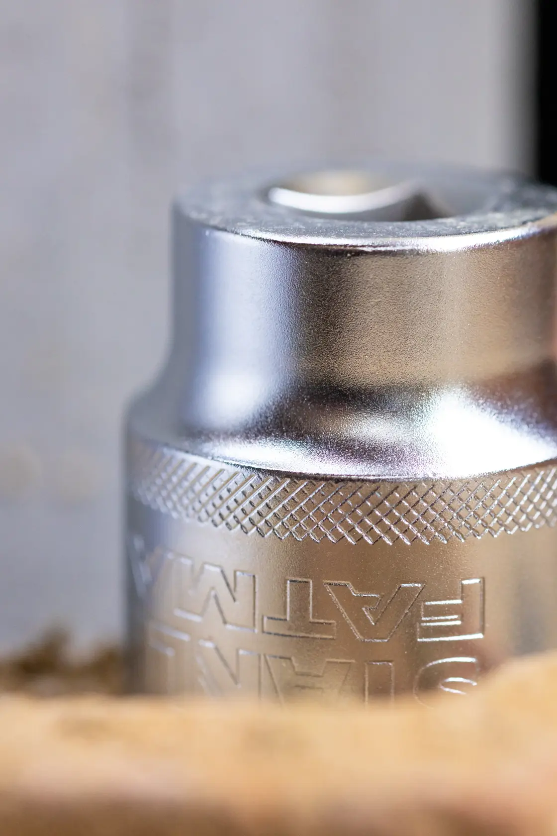 Photo of STANLEY FMMT17190-0 chrome socket tool with knurled grip, close-up angle.