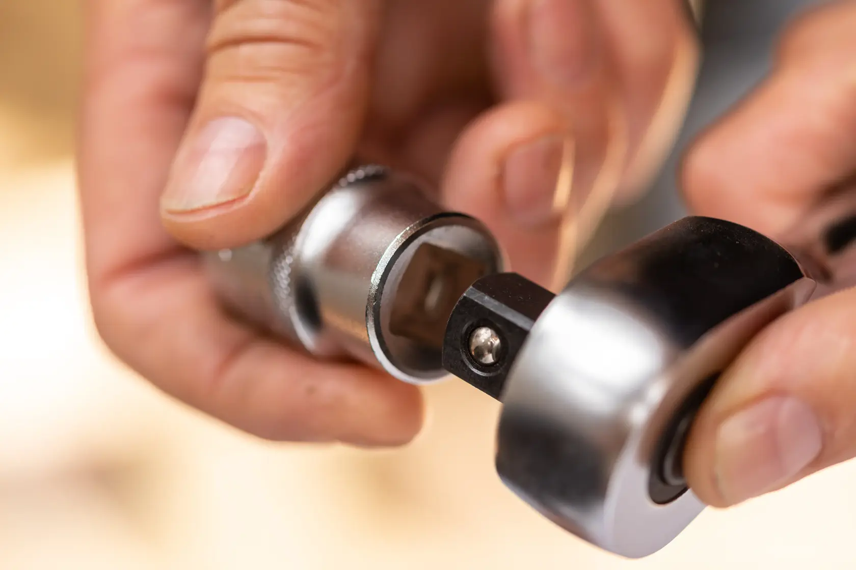STANLEY FMMT17243-0 socket wrench photography close-up of hand attaching silver socket.