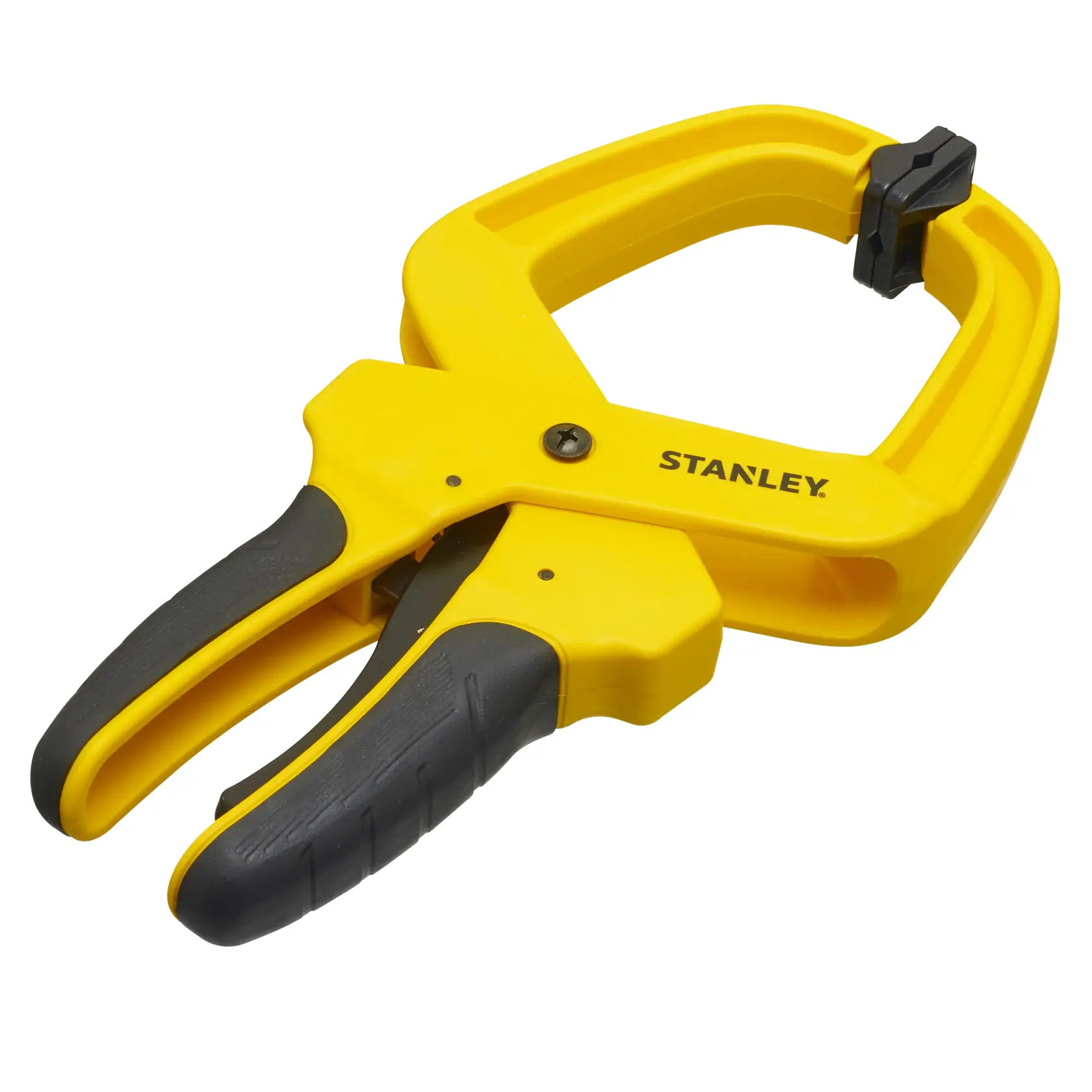 Yellow Stanley spring clamp with ergonomic black grips, used for holding objects securely during work or photography.