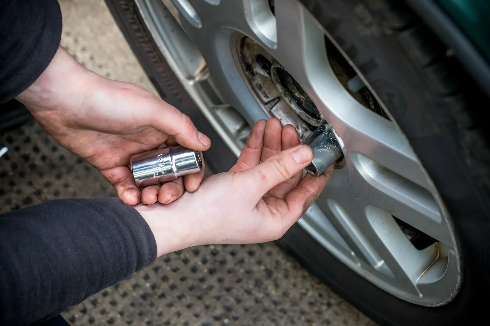 STANLEY STHT80890-0 socket used to remove wheel nut from car tire.