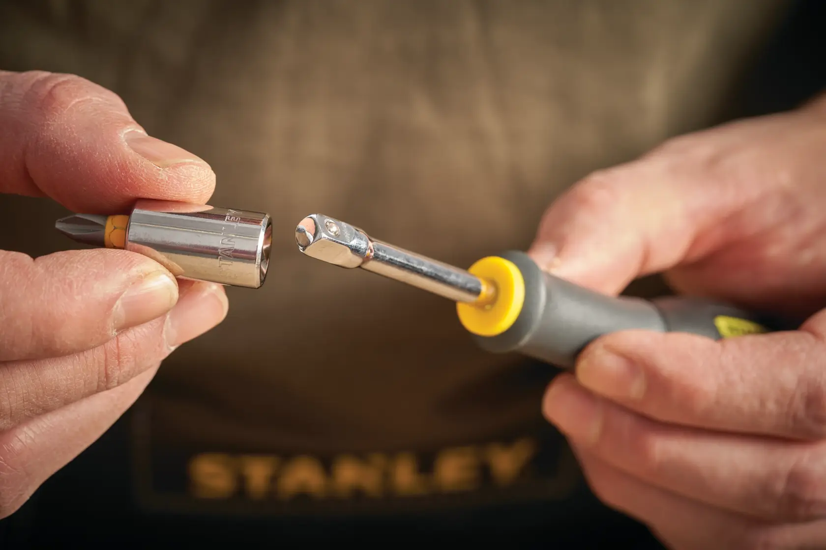 STANLEY STMT86124-0 bit holder with socket and screwdriver handle close-up photography.